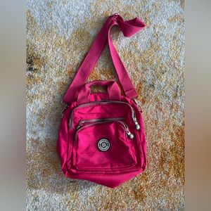 Pink Kipling off the shoulder bag